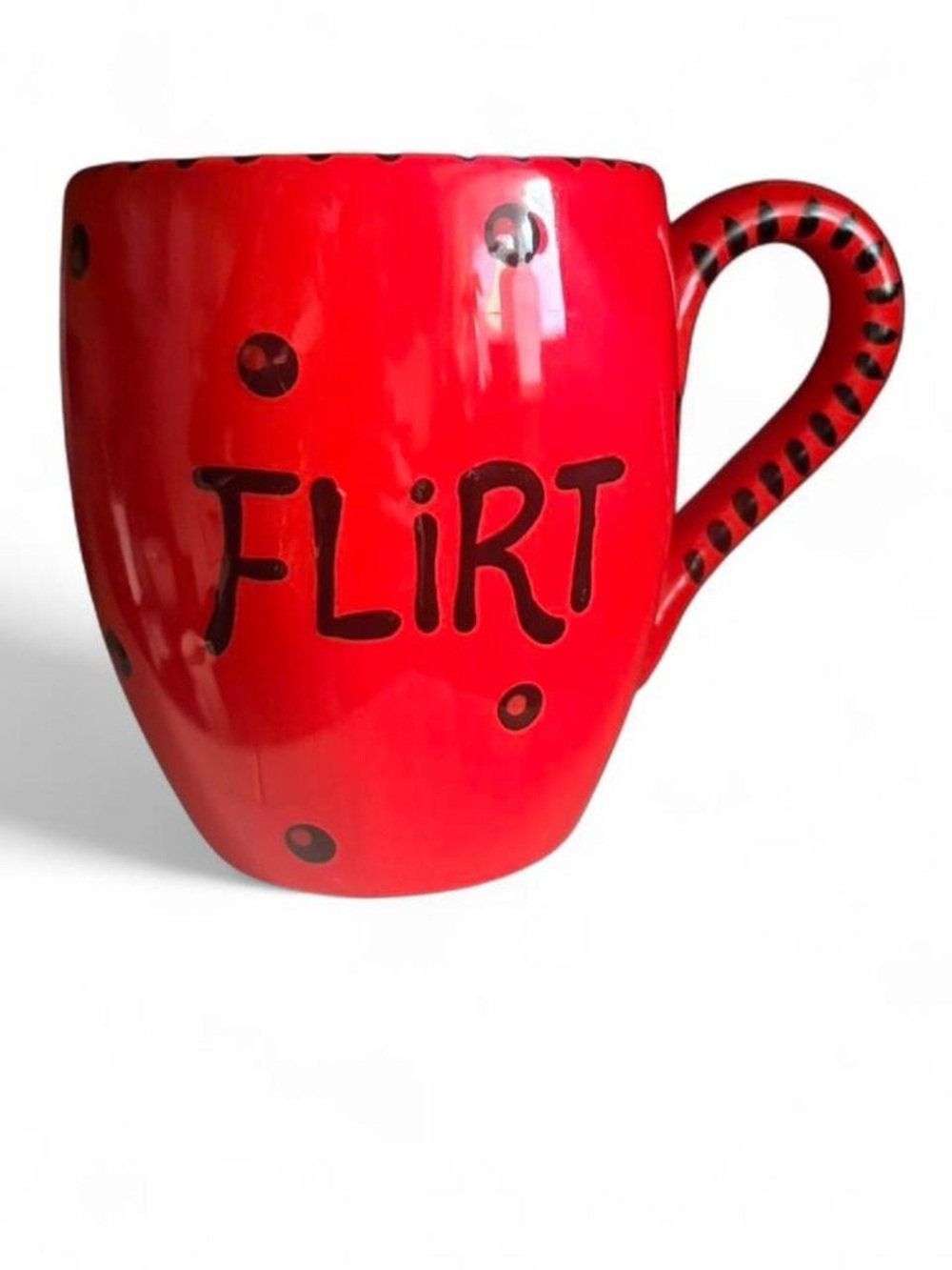 Our Name Is Mud Red Ceramic Mug with “Flirt” on it. Playful Graphic Coffee Cup